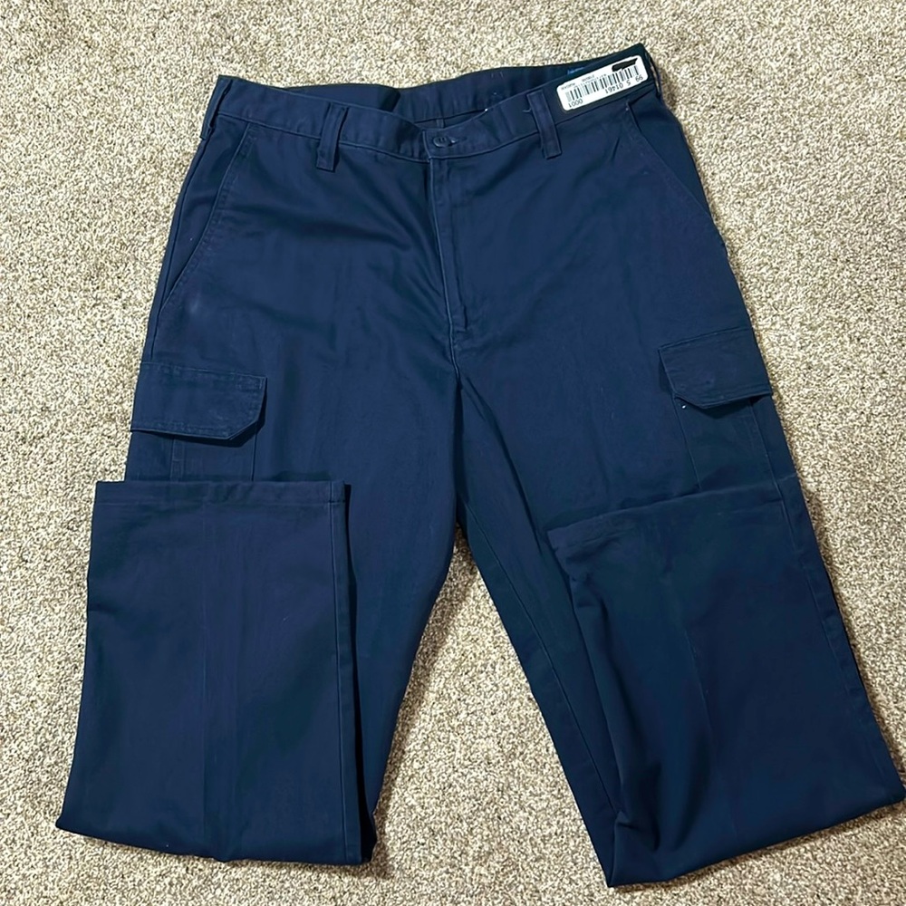 Mens work pants.  Dark blue. Size 34 waist.  Made by Cintas.